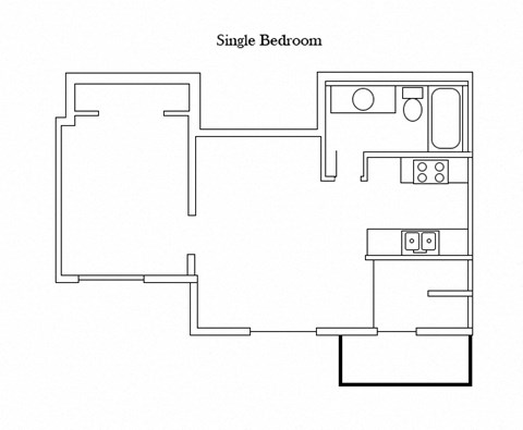 the floor plan of a small room with a stove and a microwave
